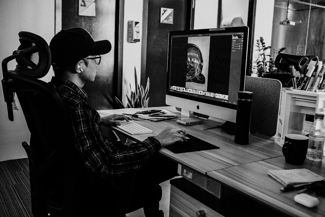 video editor at desk
