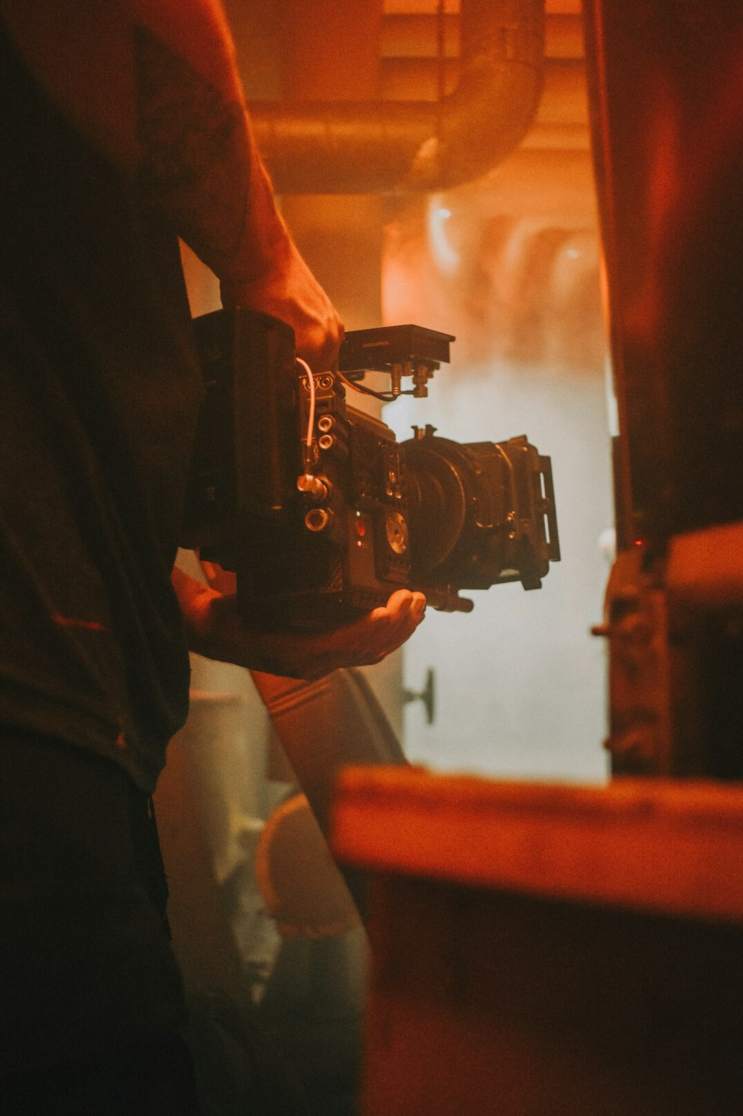filmmaker using camera on set